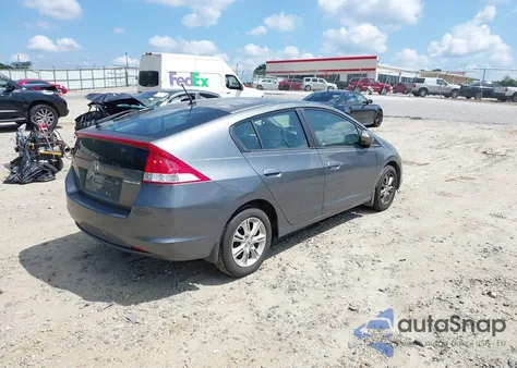 2011 Honda Insight Ex from USA, damaged, VIN JHMZE2H70BS008854
